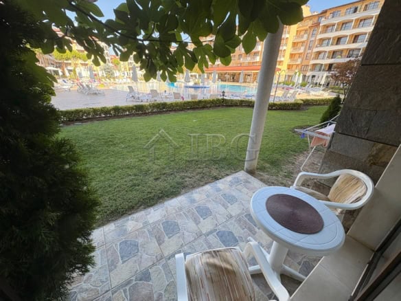 Pool view from a cozy balcony in Royal Sun apartment, Sunny Beach. Perfect for relaxing and enjoying.