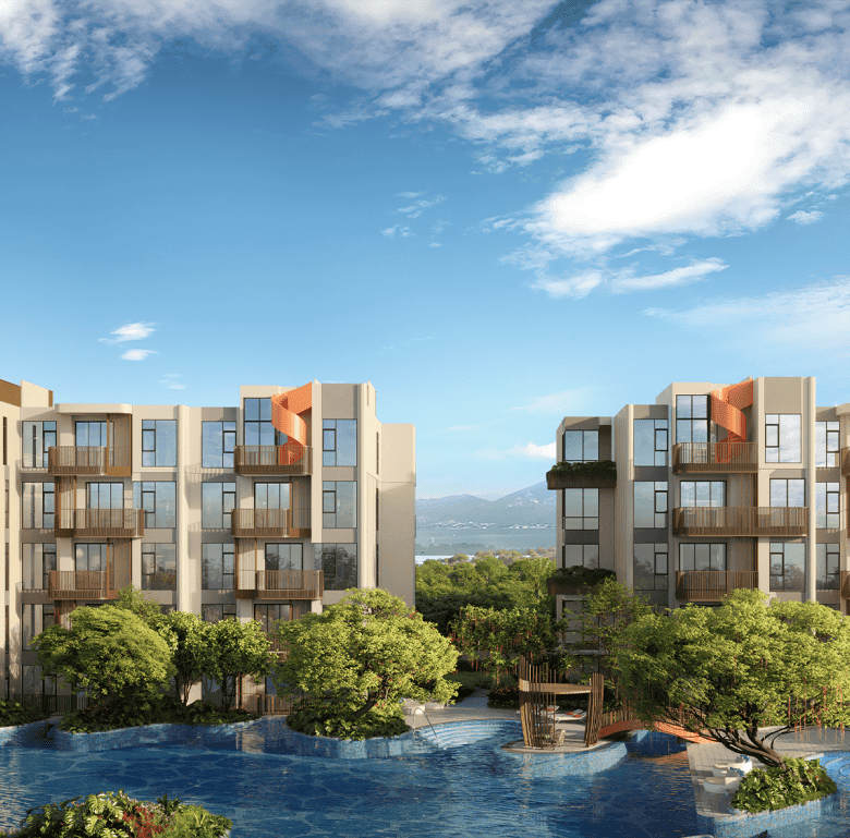 Contemporary Phuket Canvas apartments with pool, lush trees, and scenic mountain views.