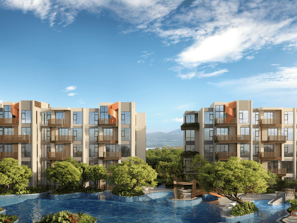 Contemporary Phuket Canvas apartments with pool, lush trees, and scenic mountain views.