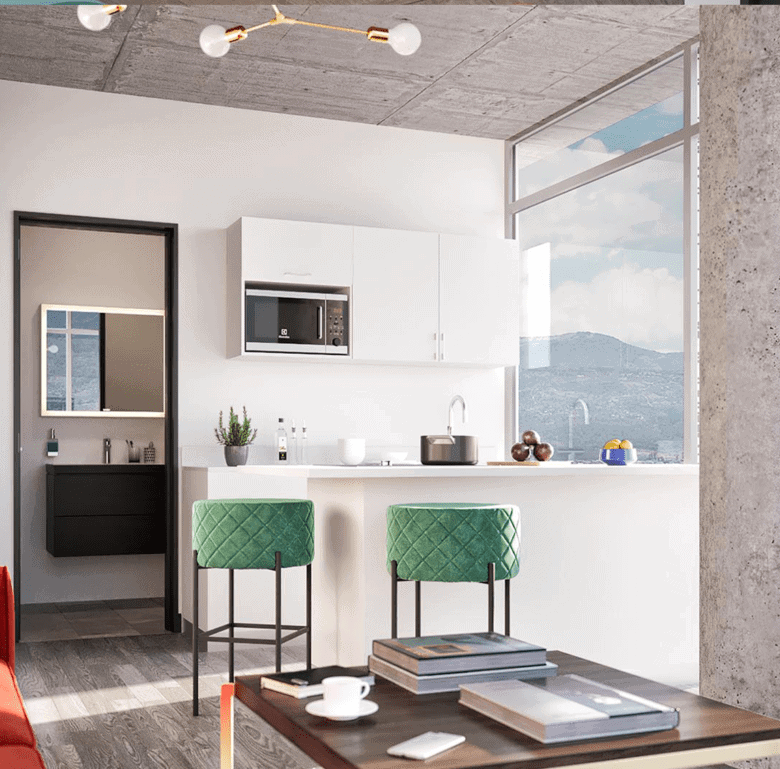 Bright open-concept kitchen with mountain scenery in Barrio Escalante, San Jose.
