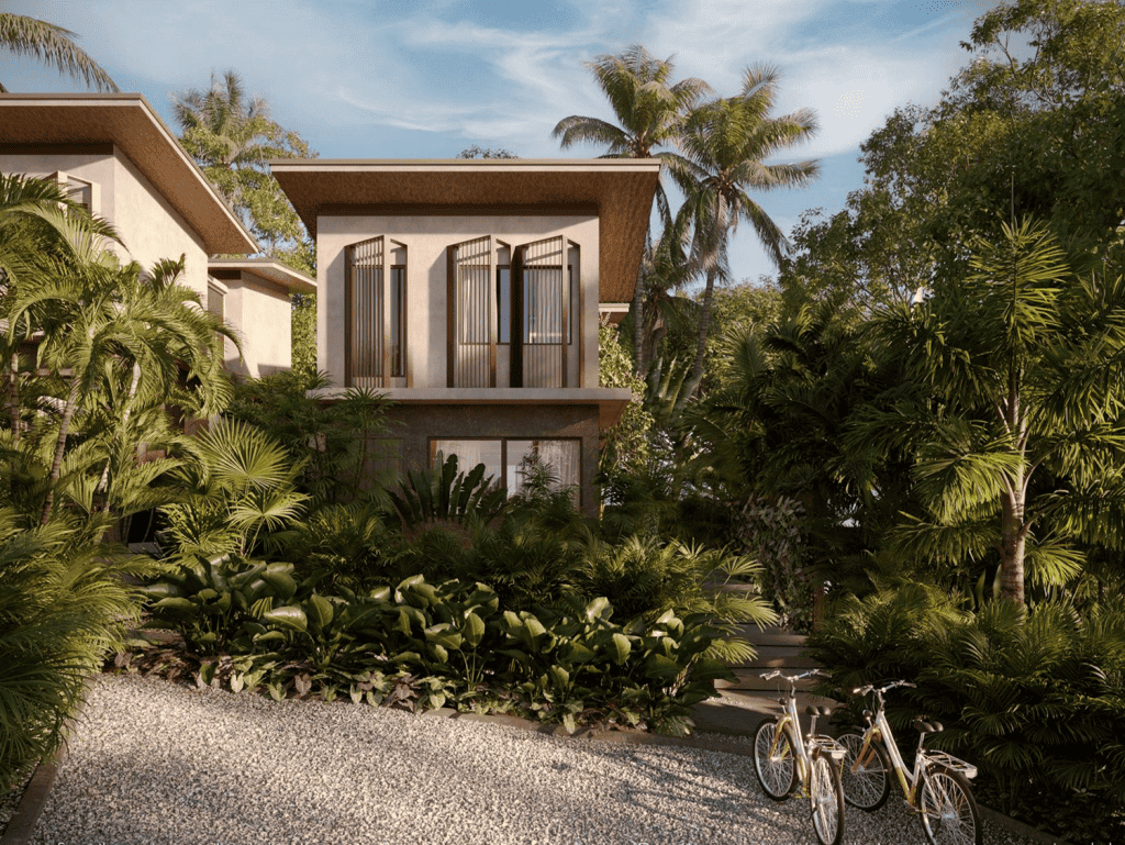 A modern Costa Rican villa surrounded by lush tropical gardens in Santa Teresa, Nicoya Peninsula.