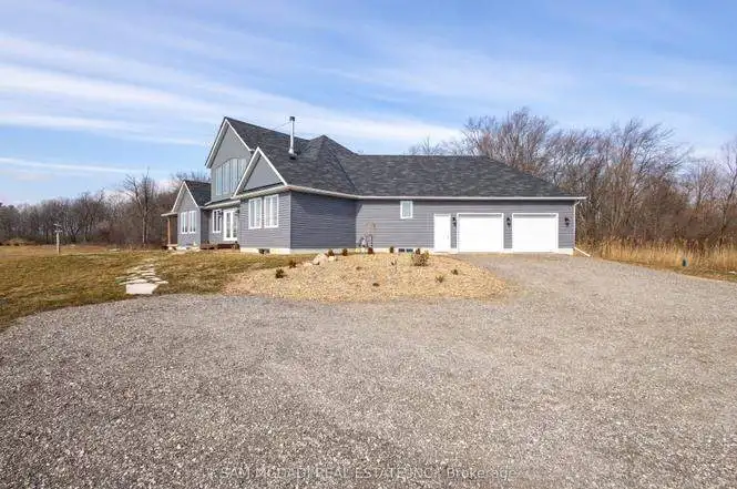 Beautiful 3-bedroom estate in Belmont, Ontario, featuring spacious living areas and a large driveway.