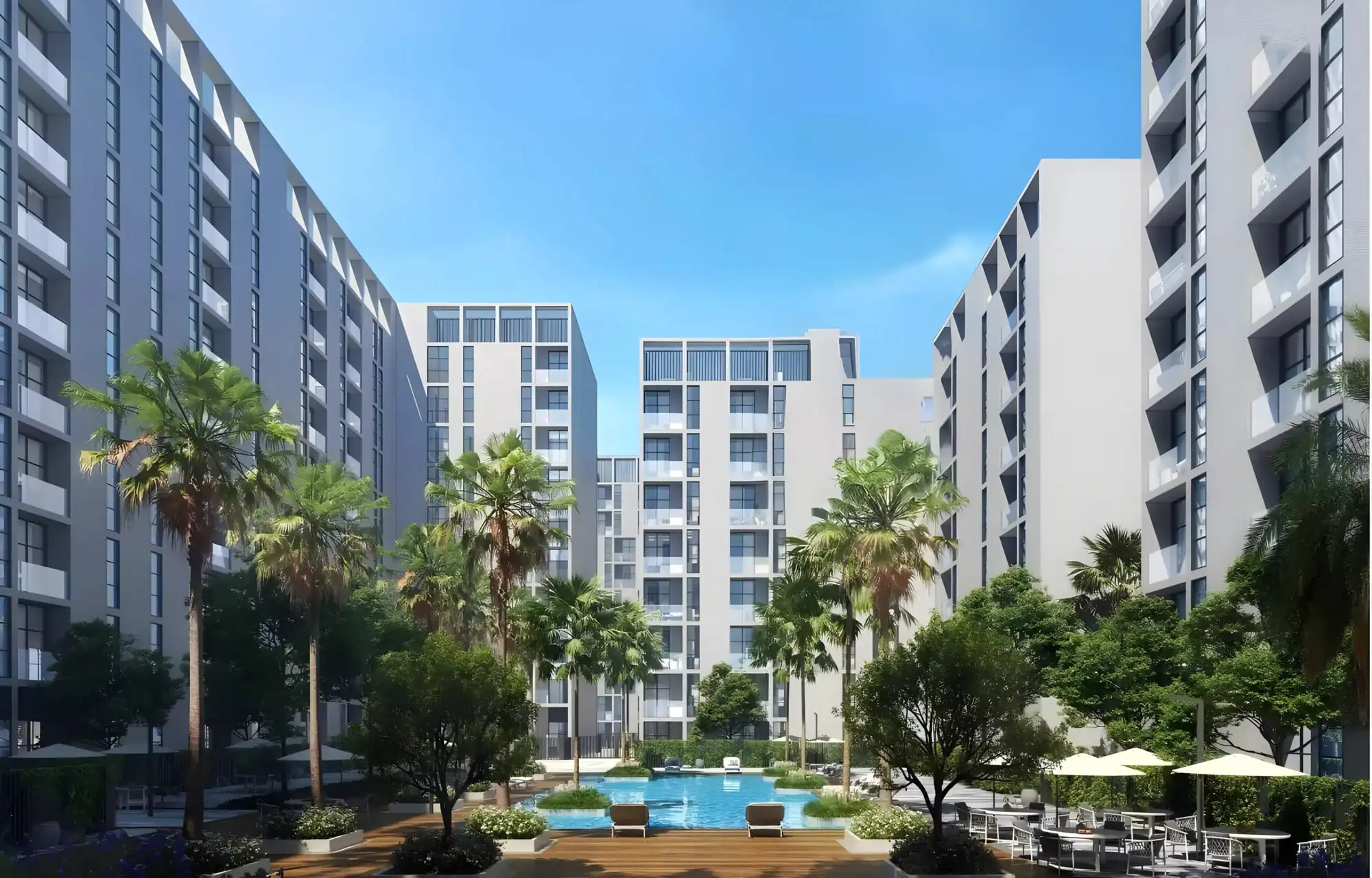 Modern Nama 3 Complex in Sharjah UAE Beautiful view of Nama 3 residential complex with lush greenery and swimming pool in Sharjah UAE.