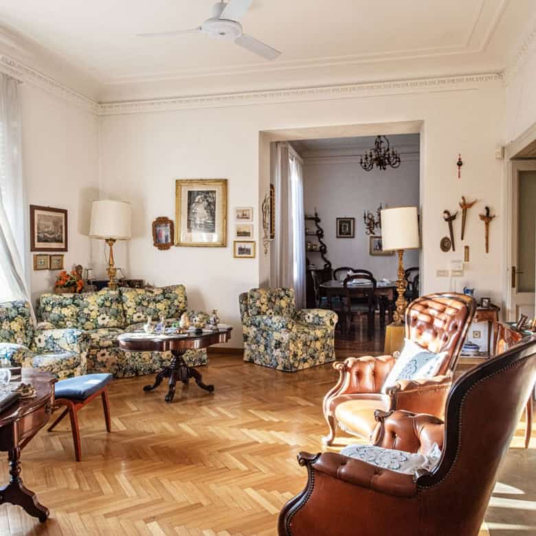 Elegant vintage living room with classic furniture in a luxury Italian villa setting.