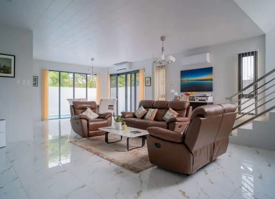 Luxury 4BR Villa Interior in The Orchard Golf Spacious living room with modern furniture in a luxury villa at The Orchard Golf and Country Club, D.