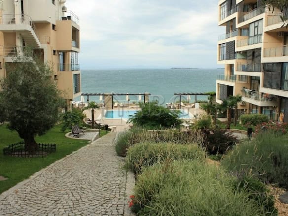 View of the sea from a modern Sveti Vlas apartment complex with landscaped gardens and pool area.