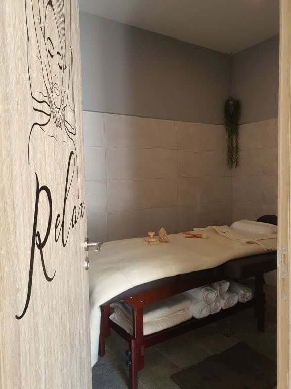 Hotel spa room at Finca Vivaldi in Leon, Spain, featuring a relaxing massage table and tranquil deco.