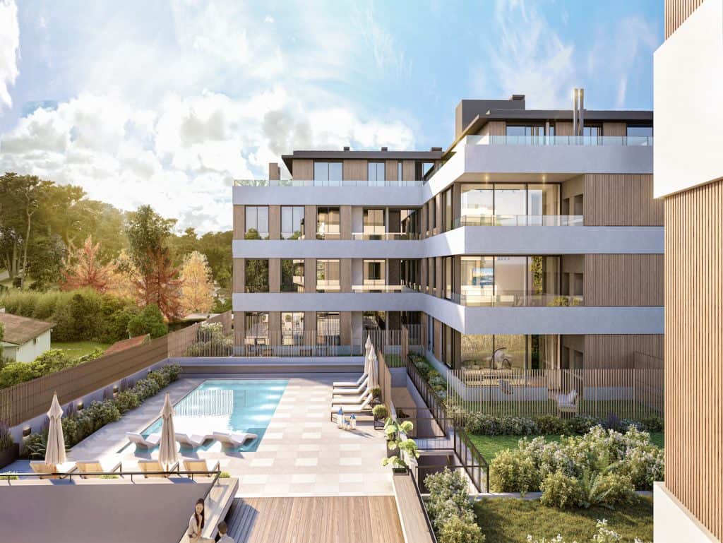 Modern apartment complex with swimming pool and outdoor lounge area in Altos, Punta del Este, Urugua.