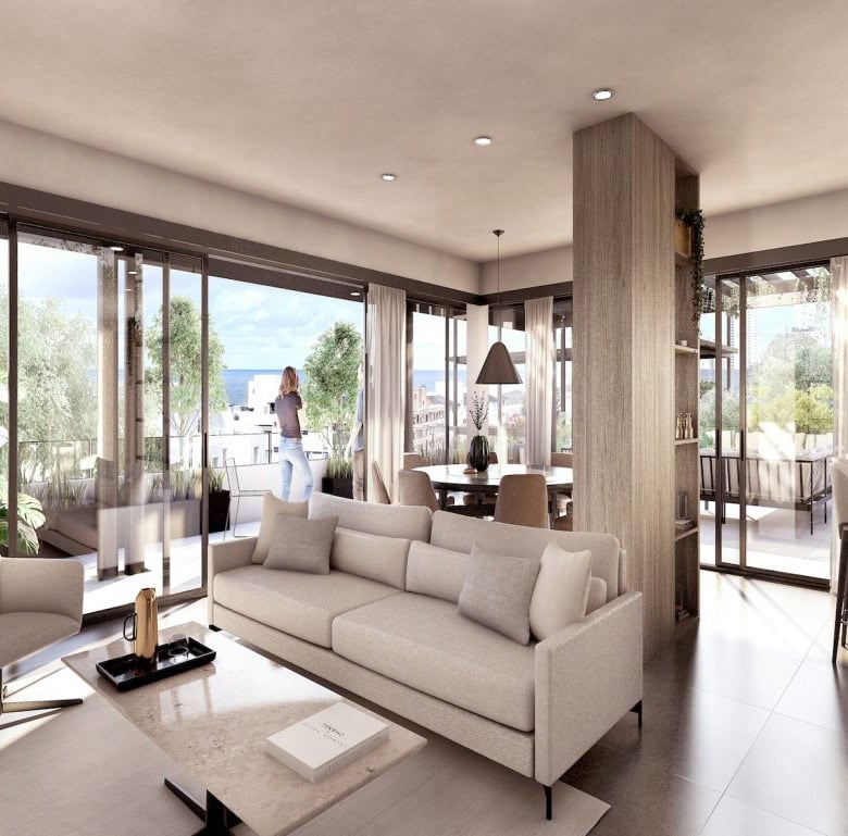 Spacious living room with large windows offering scenic views in Altos, Punta del Este, Uruguay. Bri.