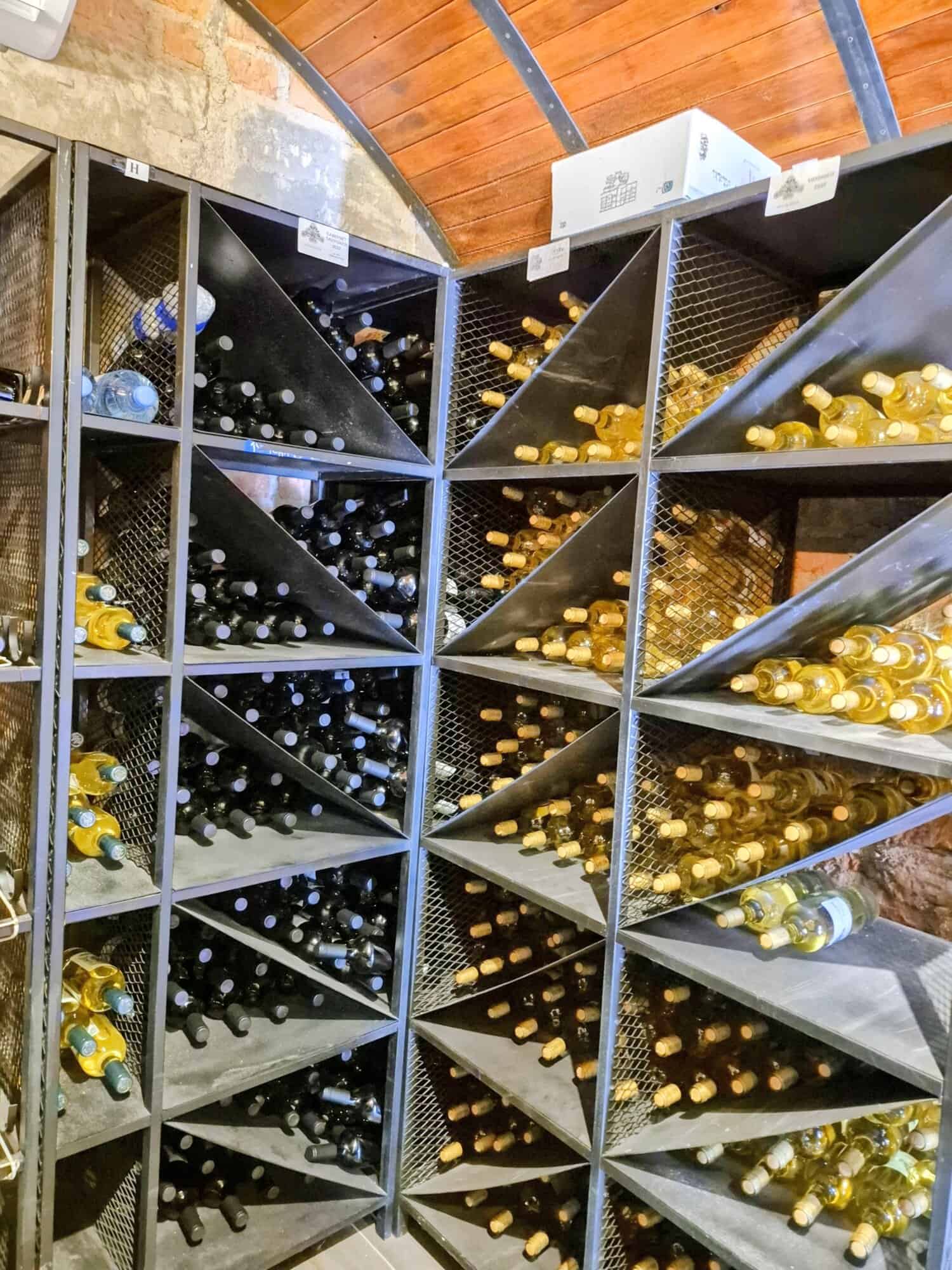 Wine bottle storage in a cellar or shop. Wine bottle storage in a cellar or shop.