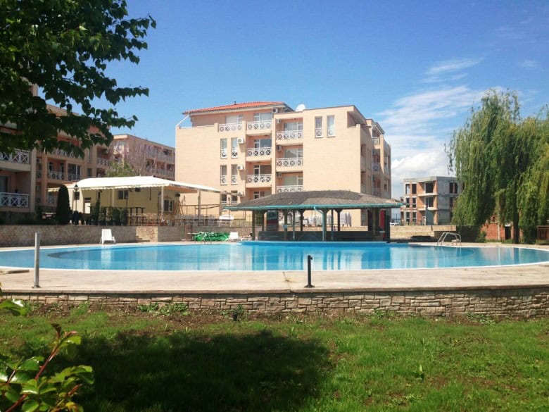 Sunny day view of top floor apartment near Sunny Beach.