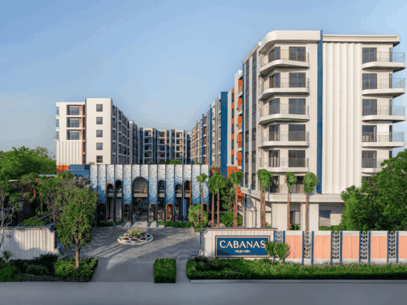 Modern Cabanas residential complex in Hua Hin, Thailand with lush greenery and contemporary architec.