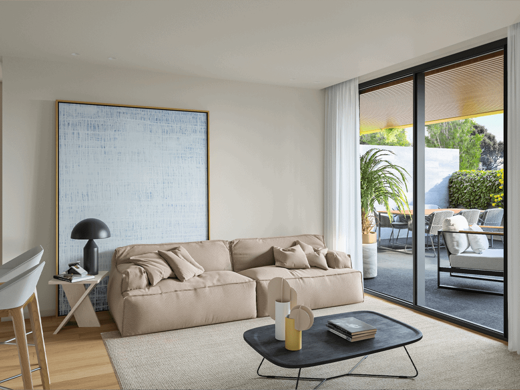 Spacious living room with beige sofa, coffee table, and balcony view in Porto, Portugal.