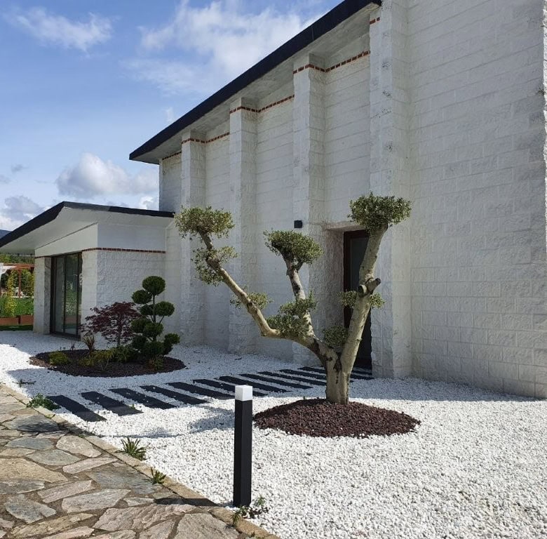 Luxury Finca Vivaldi hotel in Leon, Spain, showcasing modern architecture and landscaped gardens.
