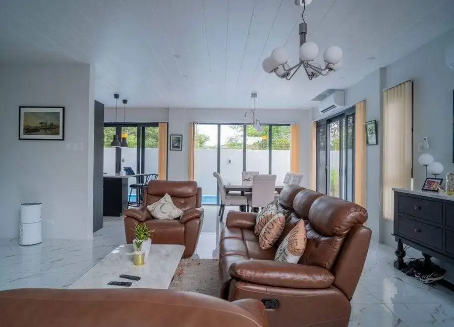 Interior view of a modern 4-bedroom villa living room in The Orchard Golf and Country Club, Dasmarin.