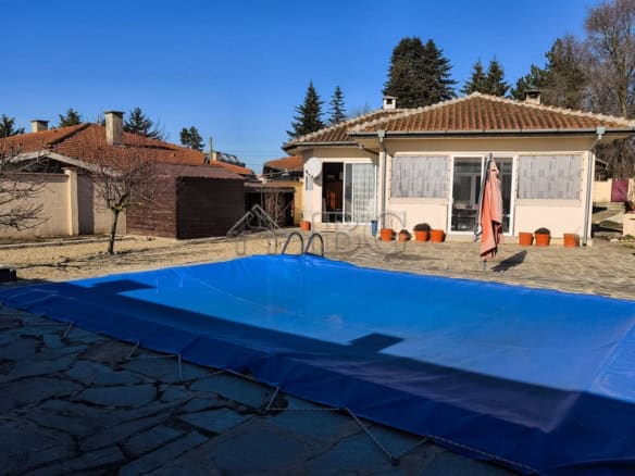 House with swimming pool close to the beach for sale.