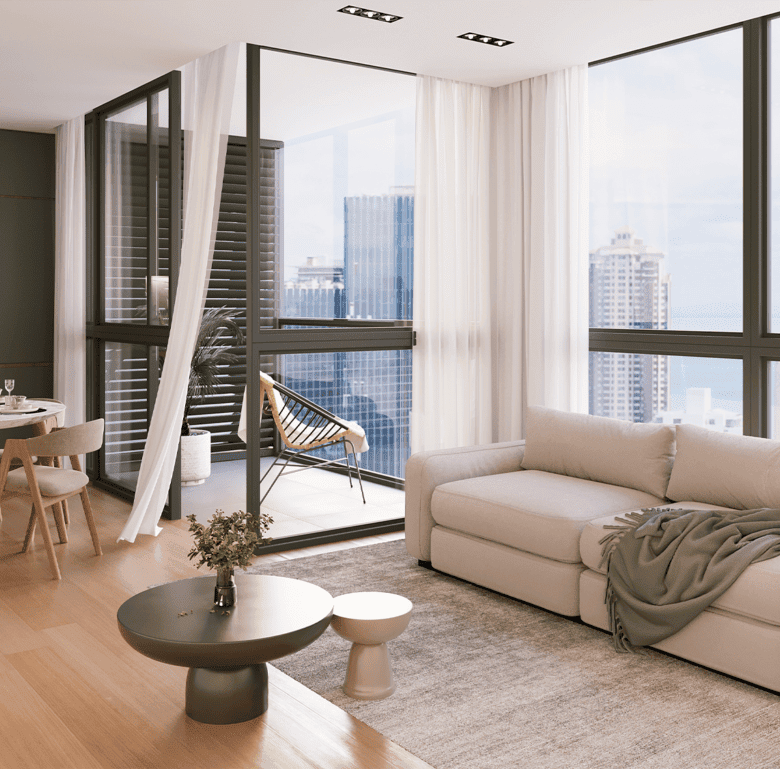 Bright living room with large windows overlooking Panama City skyline.