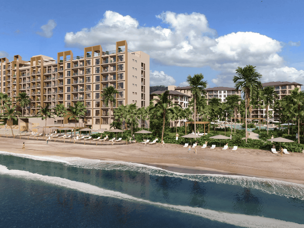Beachfront resort at Surfside - Playa Caracol, Panama with modern apartments and lush tropical surro.