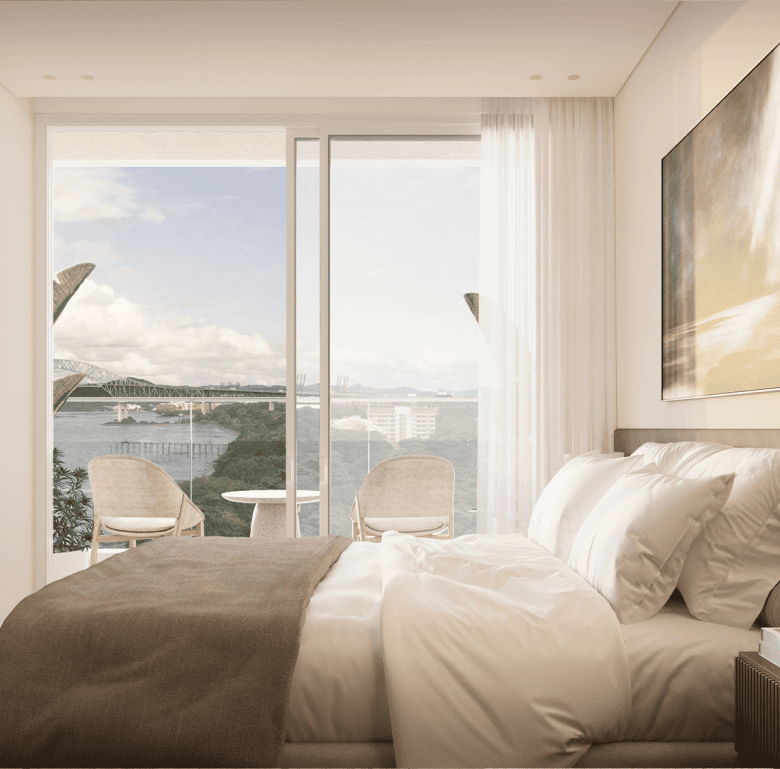 Modern bedroom with balcony overlooking Panama City skyline and water views.