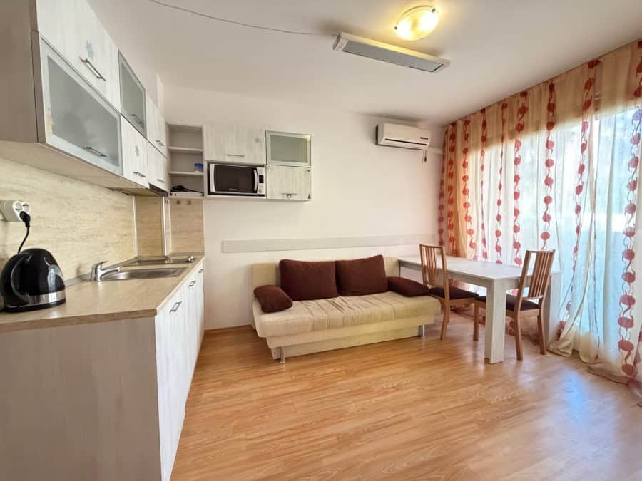 Apartment with 2 bedrooms, modern kitchen, and living area, 3 km from Sunny Beach, perfect for holid.