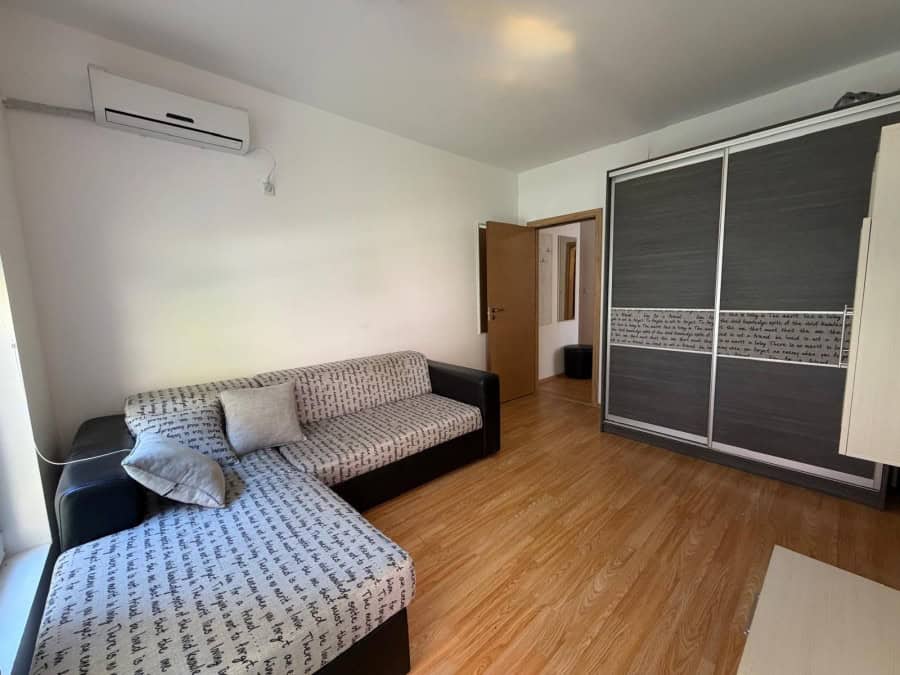 Bright 2-bedroom apartment with living room, wardrobe, and wooden flooring near Sunny Beach.