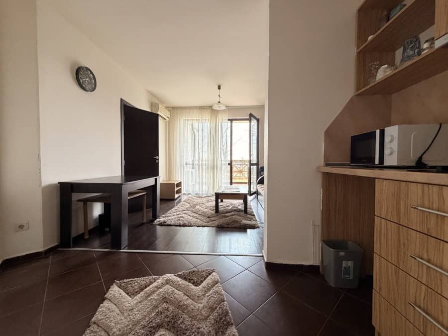 Cozy 1-Bed Apartment in Sunny Beach Bright living room with balcony access in Imperial Heights, Sunny Beach outskirts.
