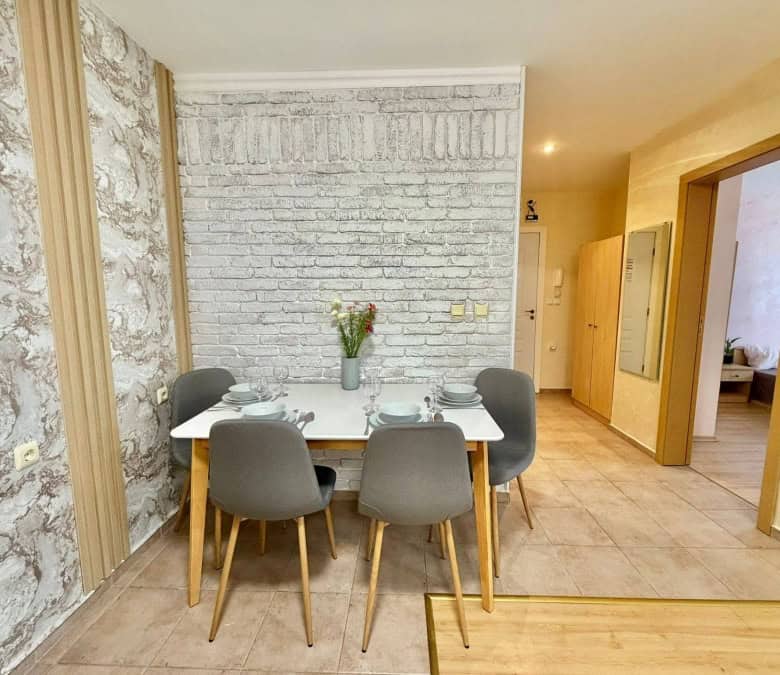 Bright dining area in a stylish apartment near the sea in Sveti Vlas.