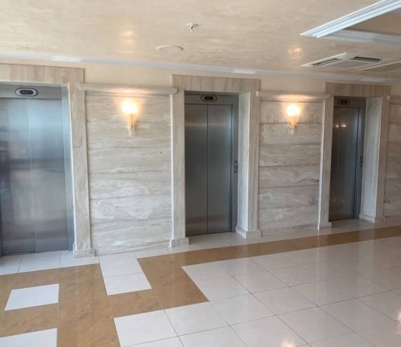 Modern elevator lobby in Sunset Resort, Pomorie with sea views and elegant lighting.