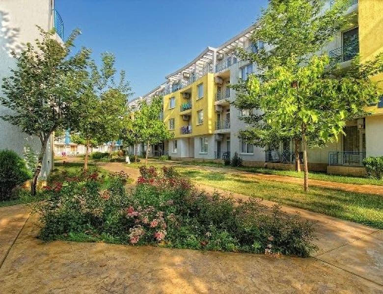 Bright exterior view of a newly furnished 1-bedroom apartment complex in Sunny Day 3, just 10 minute.