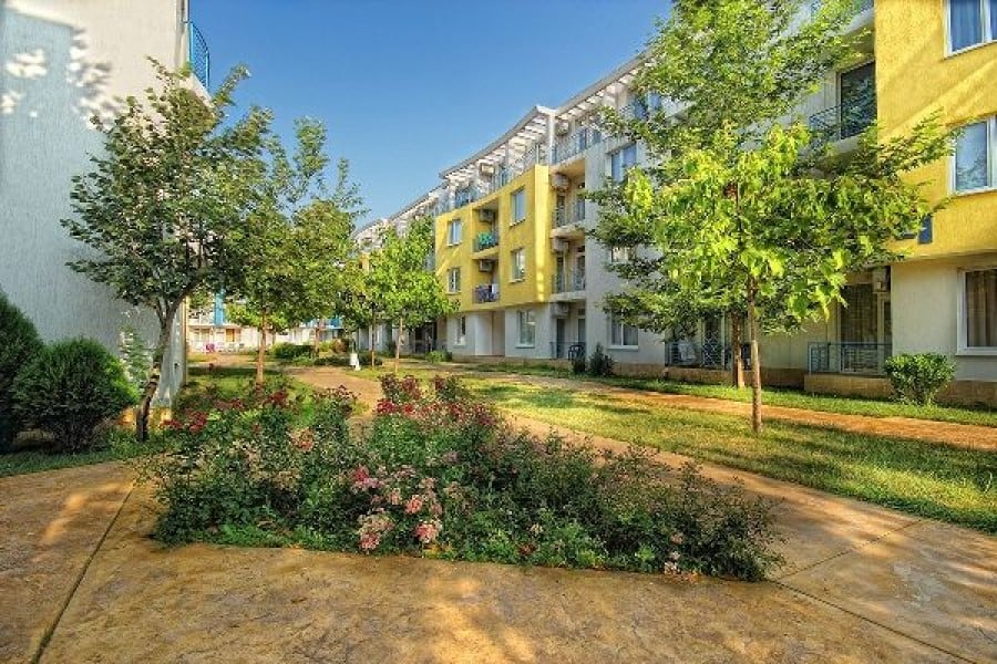Bright exterior view of a newly furnished 1-bedroom apartment complex in Sunny Day 3, just 10 minute.