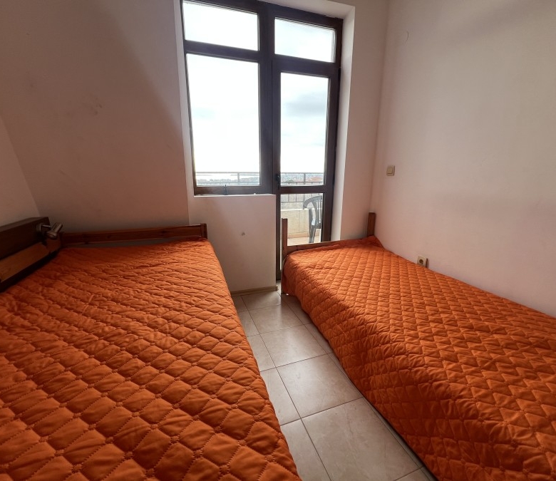Bright 2-bedroom apartment with sea, pool, and mountain views near Sunny Beach.
