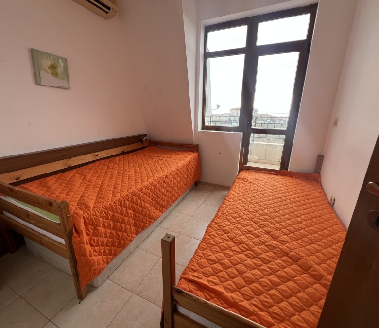 Interior of a 2-bedroom apartment with sea, pool, and mountain views near Sunny Beach.