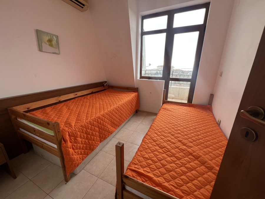 Interior of a 2-bedroom apartment with sea, pool, and mountain views near Sunny Beach.