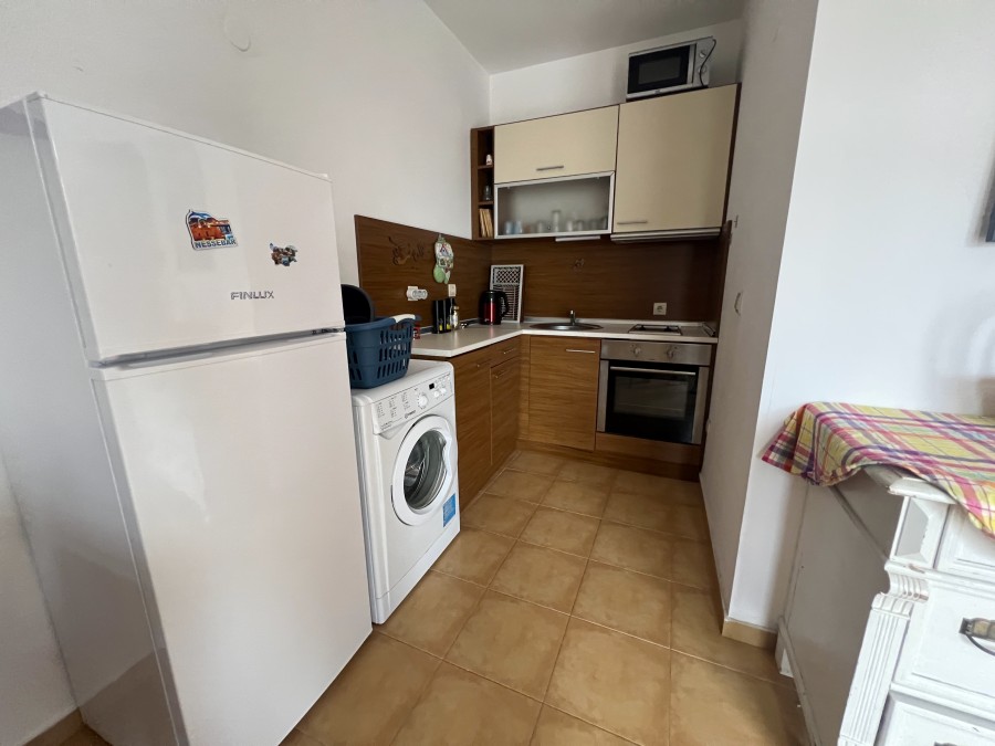 Modern kitchen in seaside apartment with mountain views, near Sunny Beach.