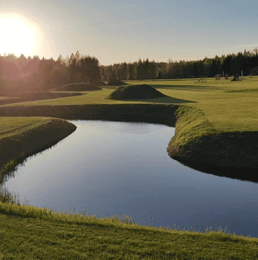 Latvian farm for sale with scenic water bodies and lush green fields. Ideal for agriculture or inves.