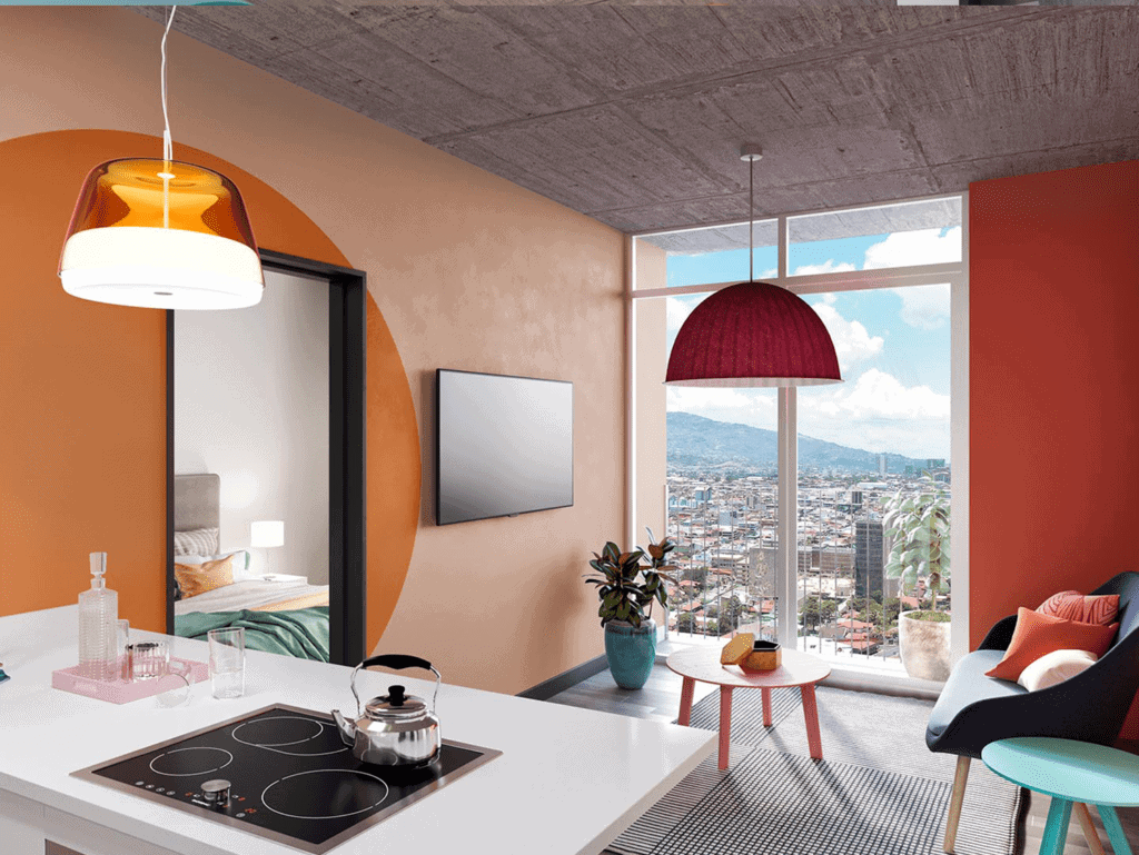 Stylish living space with vibrant decor and city views from large windows.