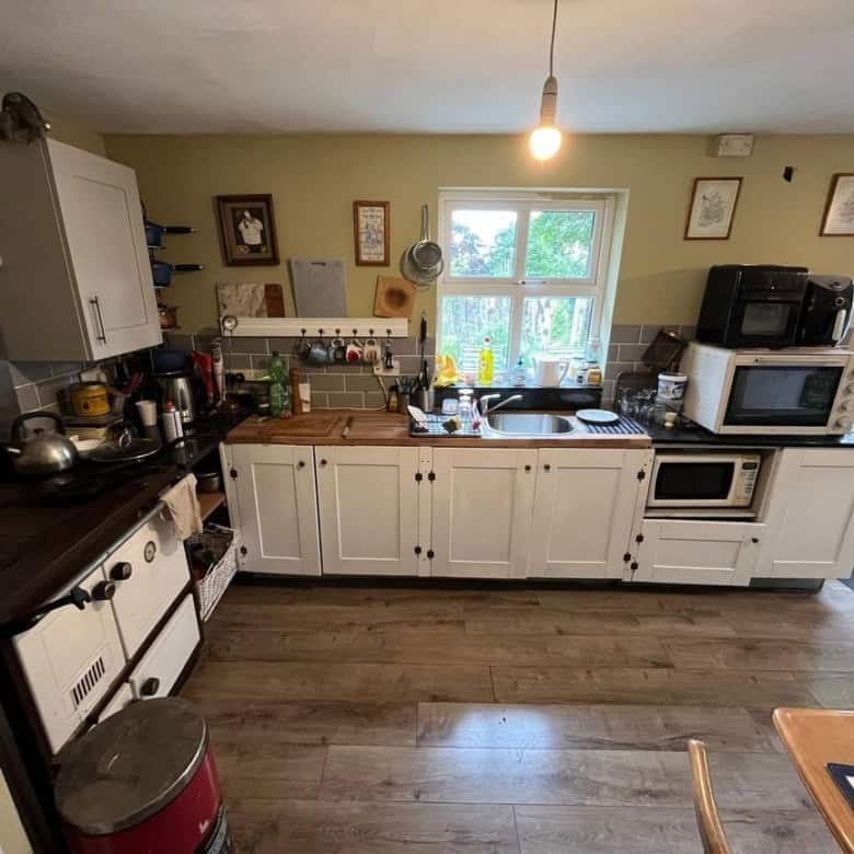 Charming 2-bedroom Irish cottage kitchen with traditional decor in Farranmacfarrell, Ballina, County.