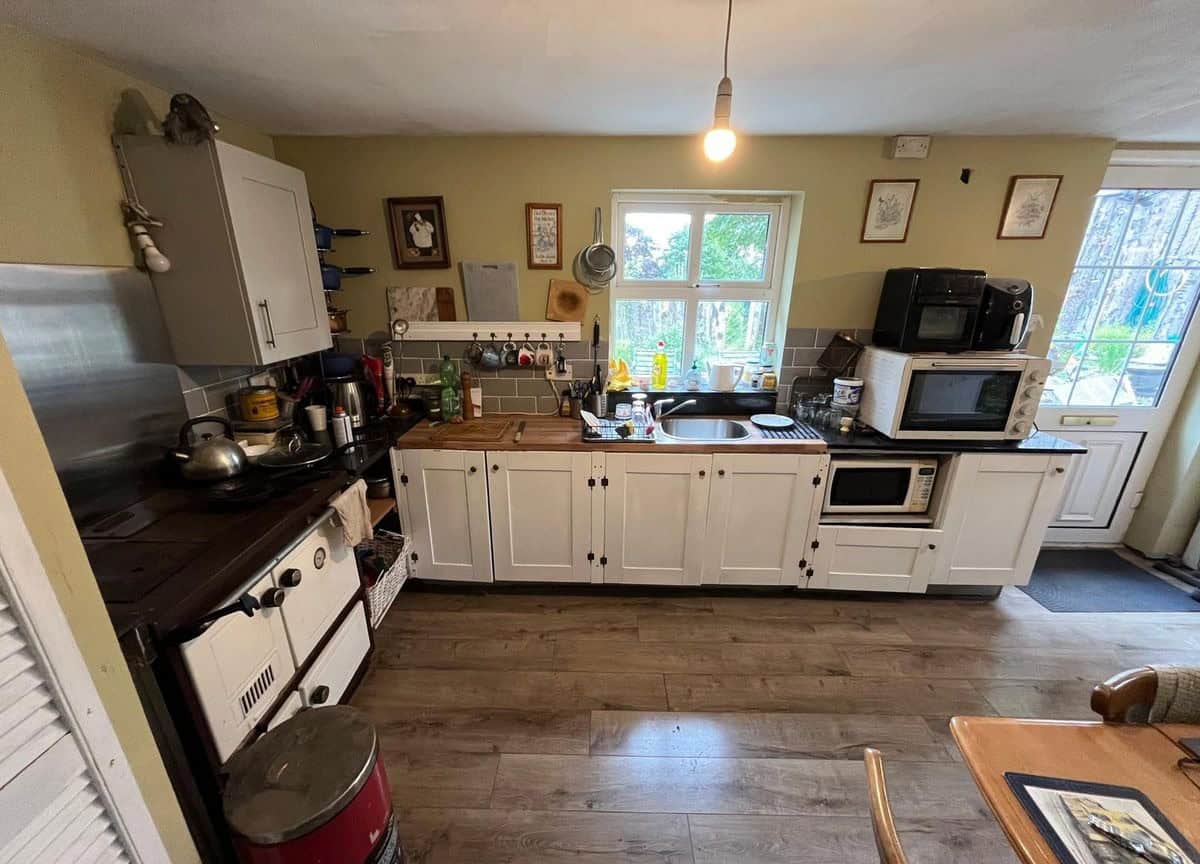 Charming 2-bedroom Irish cottage kitchen with traditional decor in Farranmacfarrell, Ballina, County.