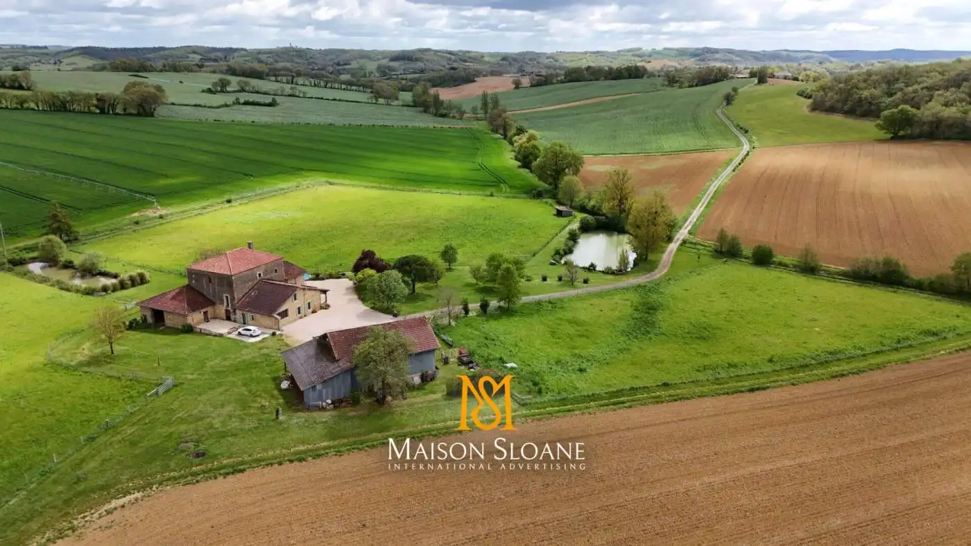 Equestrian property for sale in Castelnaud d'Angles, Occitanie, France, featuring lush green fields.