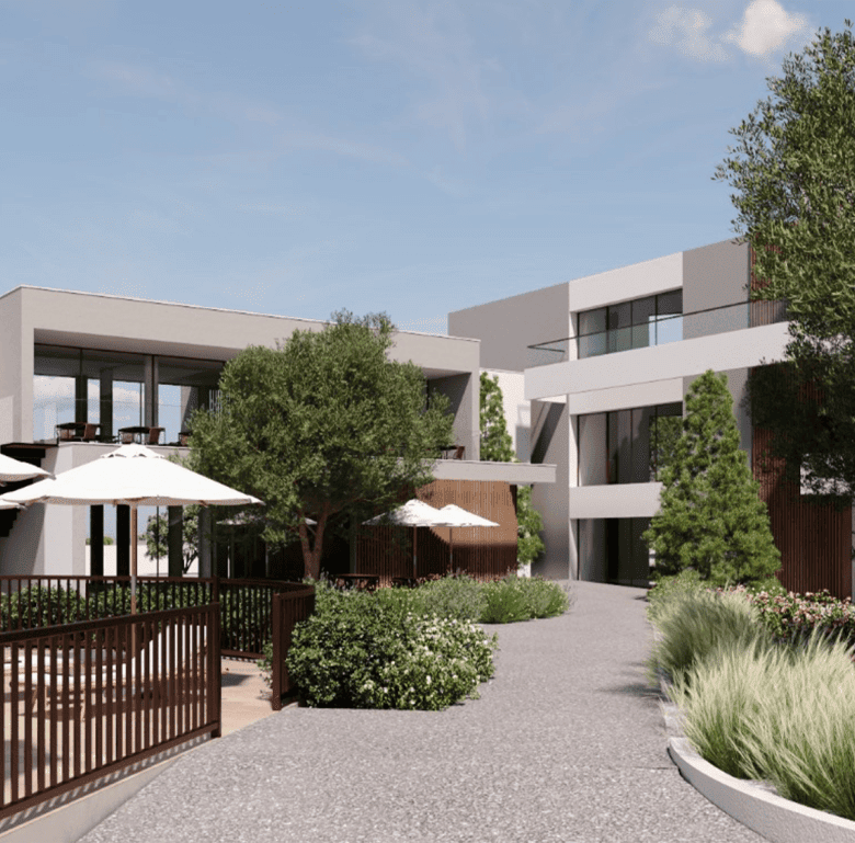 Contemporary Algarve property with landscaped gardens, outdoor seating, and modern architecture.