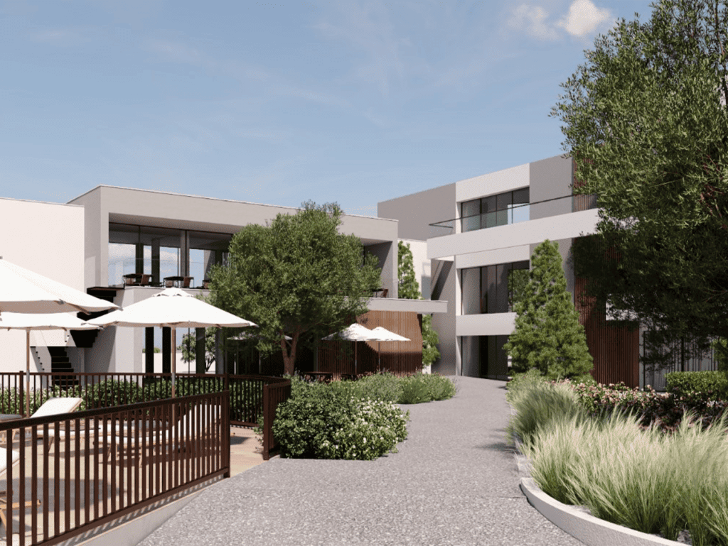 Contemporary Algarve property with landscaped gardens, outdoor seating, and modern architecture.