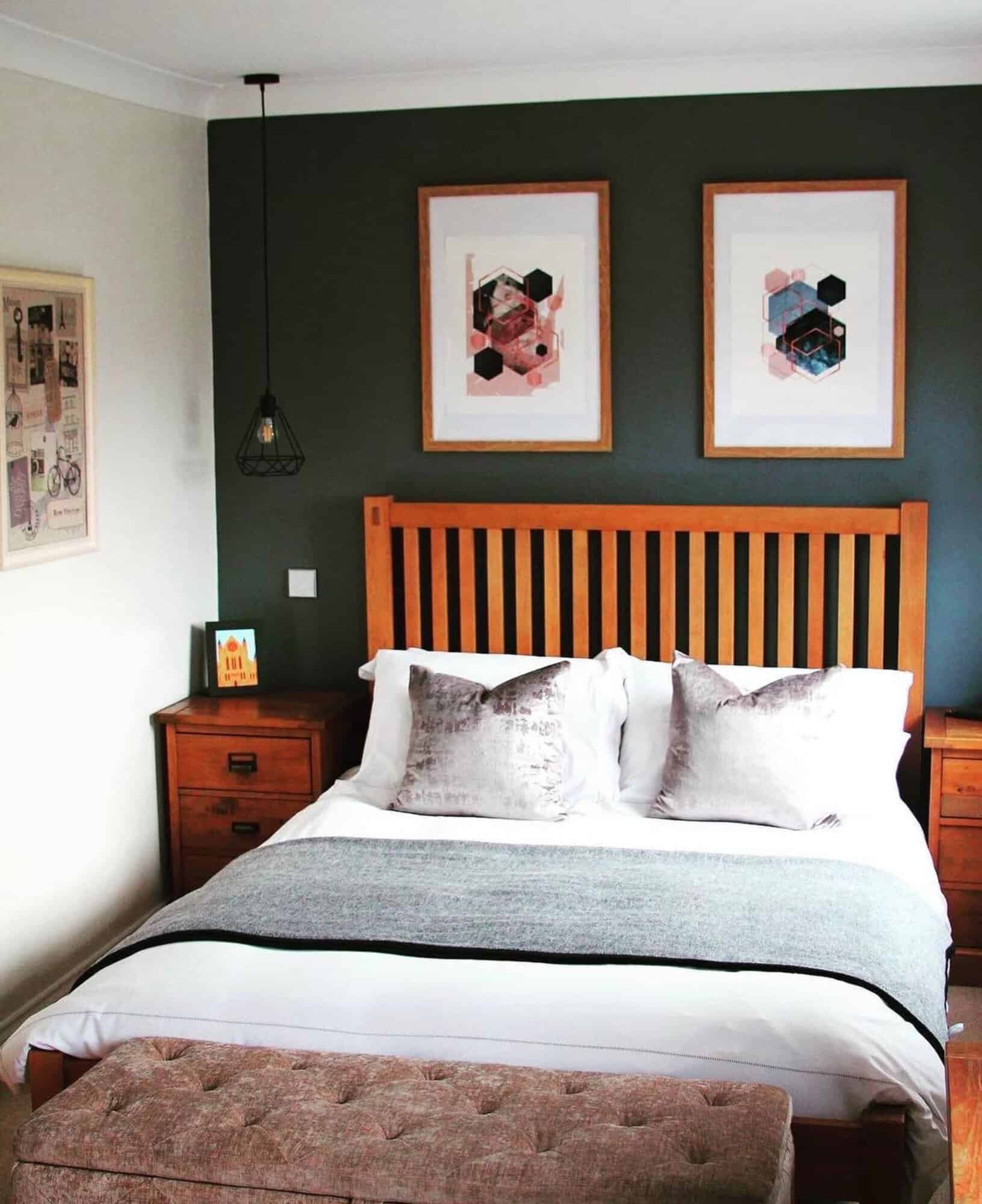 Modern bedroom with wooden bed frame and stylish decor Modern bedroom with wooden bed frame, abstract wall art, and cozy bedding.