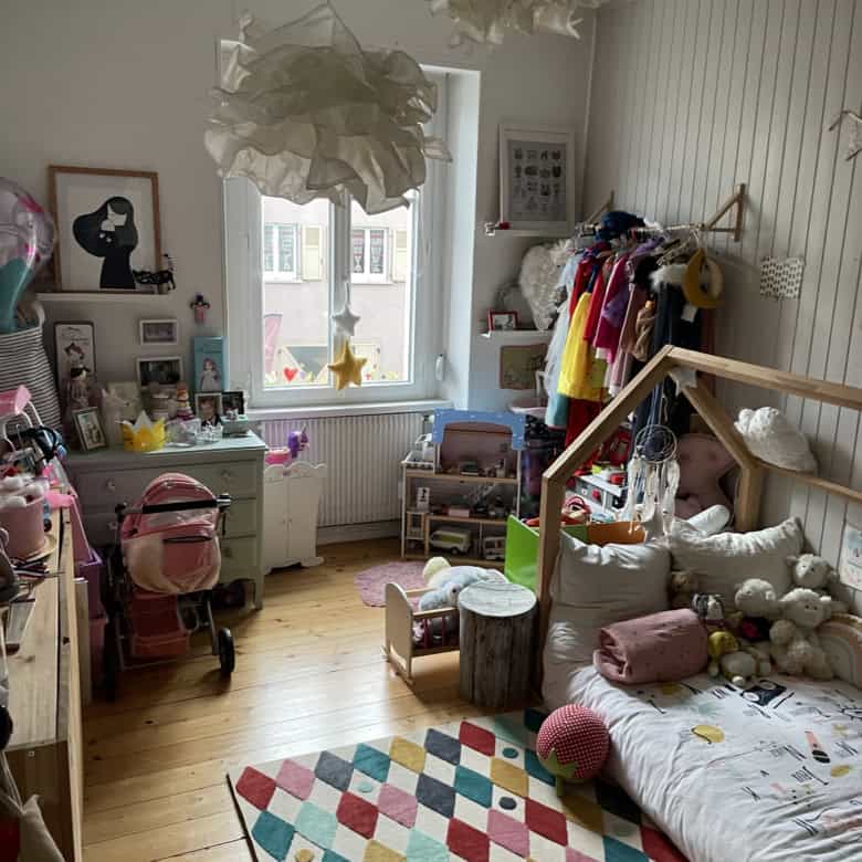 Bright interior of a charming 3-bedroom apartment in Altkirch, France, featuring playful decor and a.