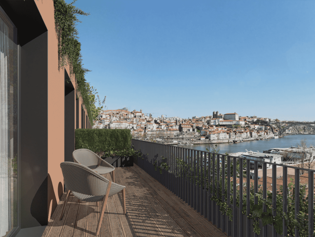 Beautiful balcony view of Porto's historic cityscape and Douro River from Land Roots property.