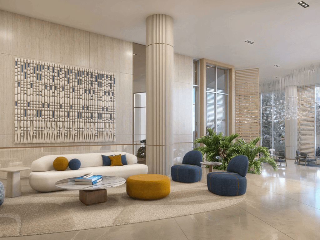 Elegant Miami property lobby featuring contemporary furniture, lush plants, and large windows with s.