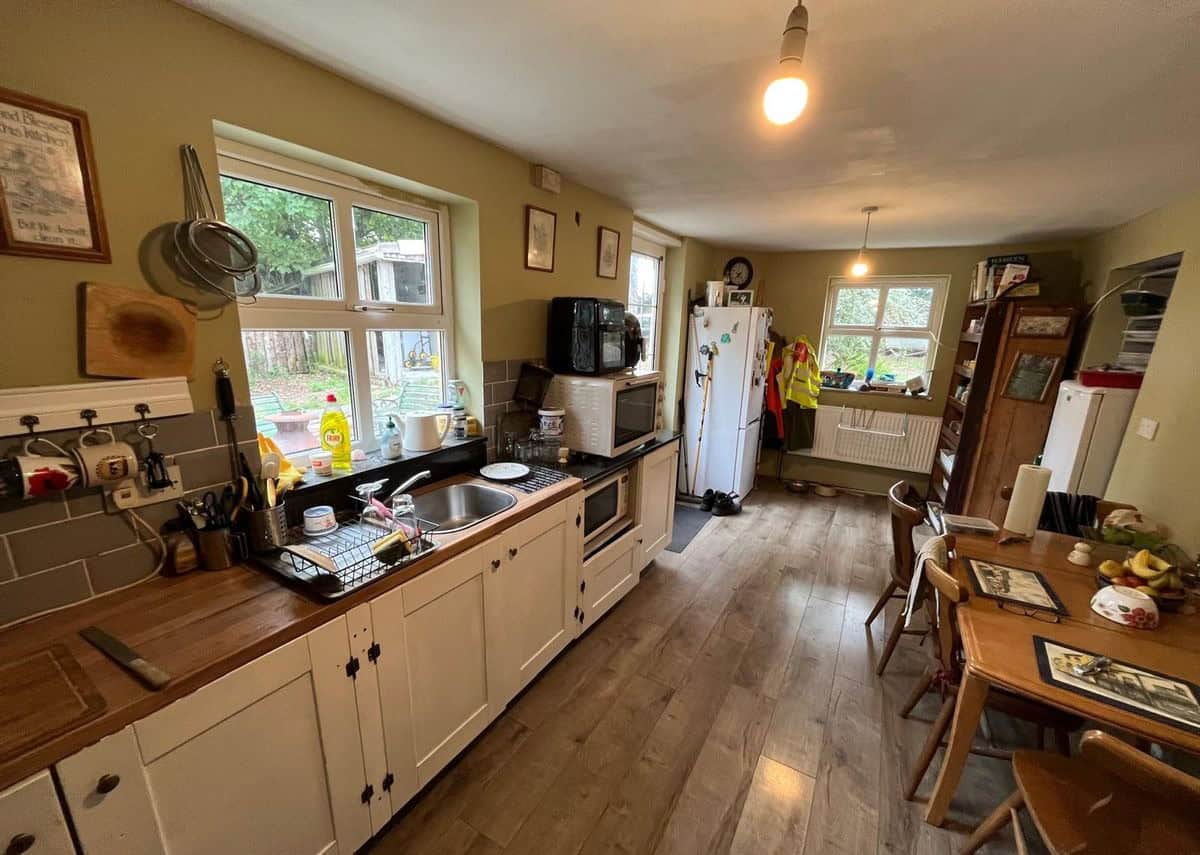 Charming 2-bed Irish cottage kitchen in Farranmacfarrell, Ballina, County Sligo, featuring rustic de.