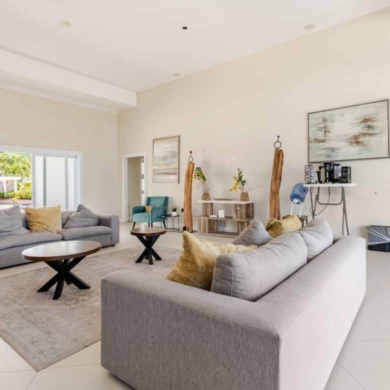 Spacious living room with modern furniture and bright natural light in Sunshine Seashore Ocean Point.