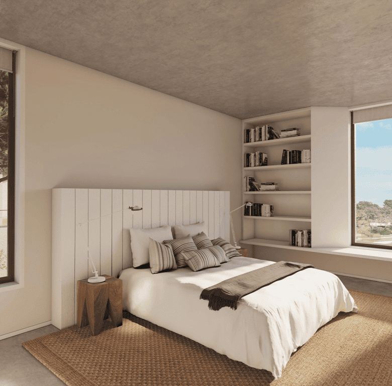 Spacious bedroom with large windows offering scenic views of Ferragudo village in Algarve.