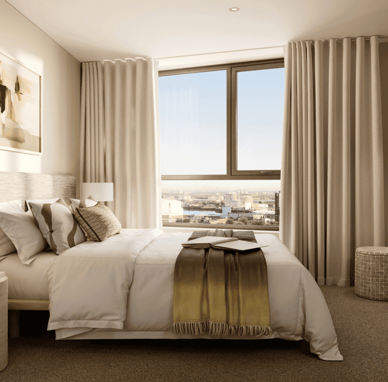 Modern bedroom with city view in Woolwich Tower, London.