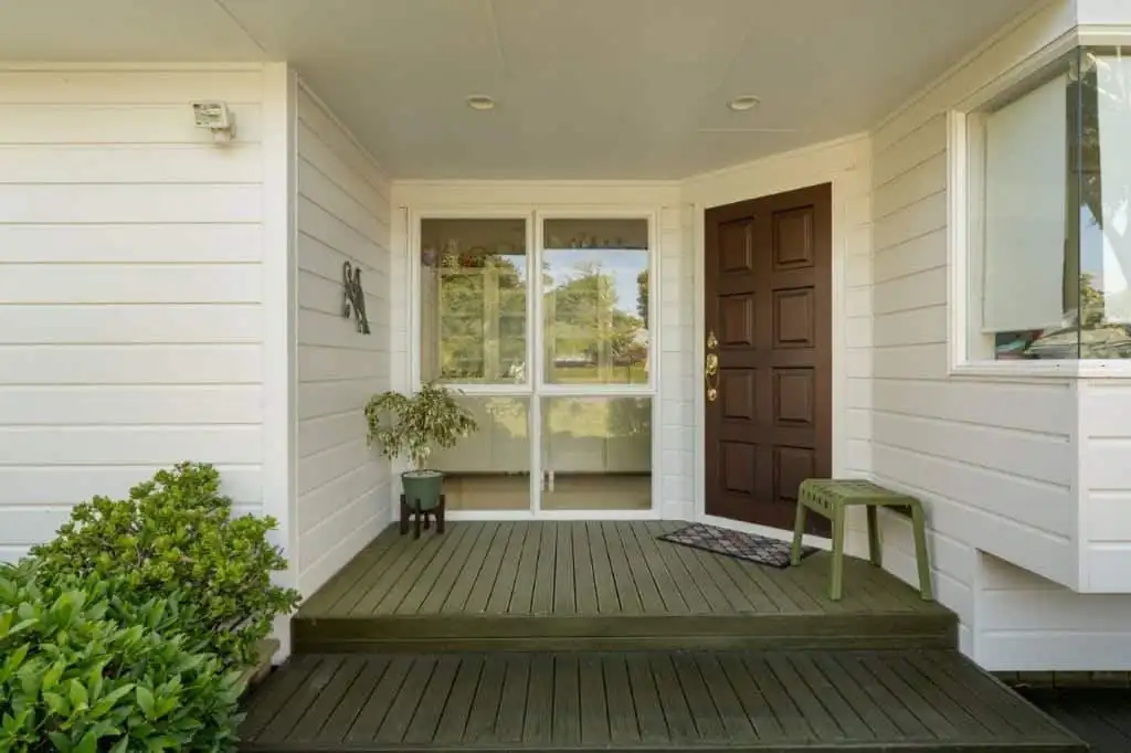 Cozy Cottage Entrance in Tauranga, New Zealand Front porch of a charming cottage in Tauranga, Bay of Plenty, New Zealand.